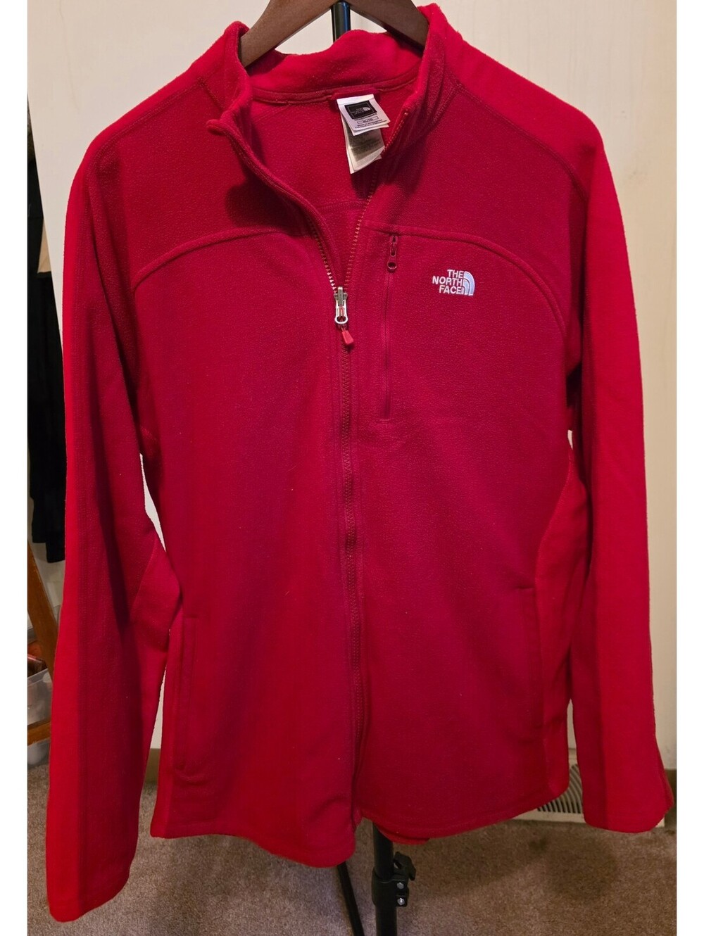 The North Face red full zip fleece jacket
